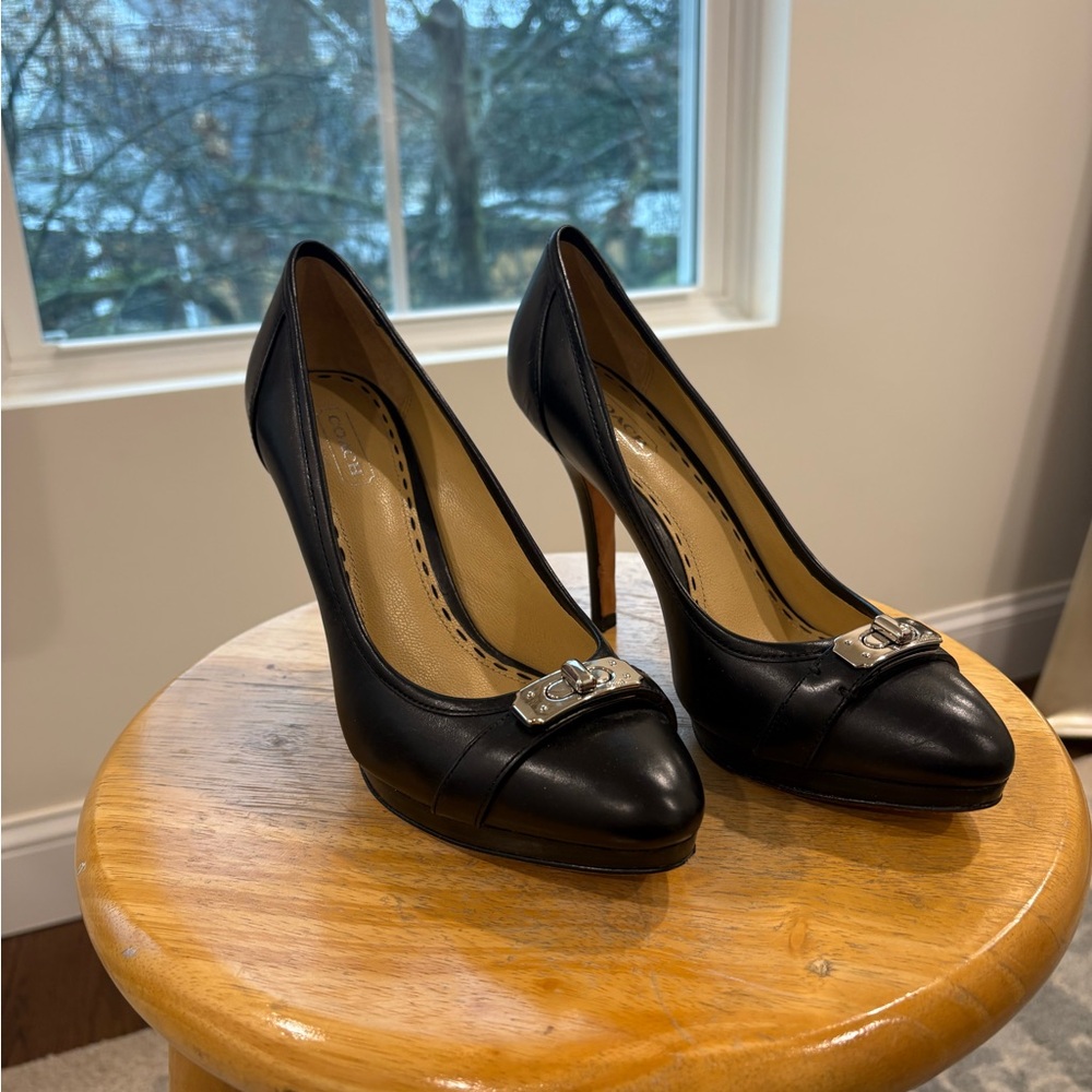 Coach - black leather heels with silver hardware!